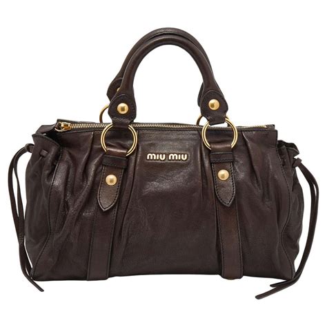 brown leather miu miu bag